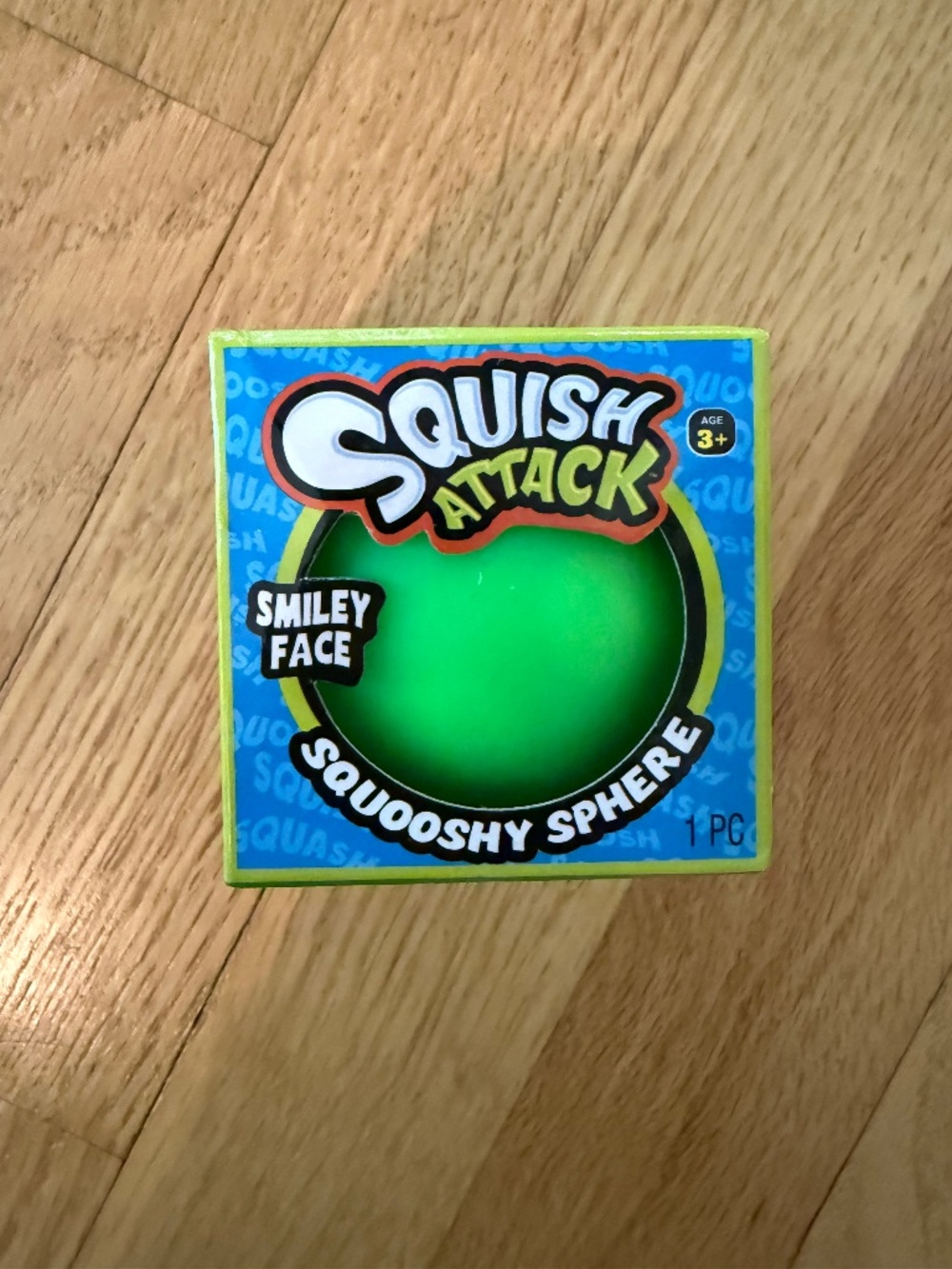 Green Squish Attack Smiley Face Ball Green